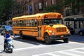 New York City, USA - June 9, 2017: School bus stopped at traffic light Royalty Free Stock Photo