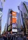 New York City, USA - June 7, 2017: People activity in Times Square at night. Times Square is a busy tourist intersection of neon a Royalty Free Stock Photo