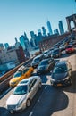 New York City, USA - March 19, 2017 : Afternoon rush hour traffic on the Brooklyn Bridge vehicle road Royalty Free Stock Photo