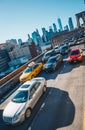 New York City, USA - March 19, 2017 : Afternoon rush hour traffic on the Brooklyn Bridge vehicle road Royalty Free Stock Photo