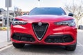 New York City, USA - March 31, 2024: 2024 Alfa Romeo Stelvio Veloce luxury red car parked outdoor, front view Royalty Free Stock Photo