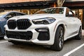 New York City, USA - March 15, 2024: BMW X6 modern white car parked outside, corner view