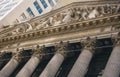 New York City, USA - March 19, 2014: Facade of the New York Stock Exchange on Wall Street. Is the largest exchange market in the Royalty Free Stock Photo