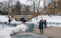 New York City, USA - March 18, 2017: People stroll and joggers run on the Mall in Central Park. Central Park is the most visited Royalty Free Stock Photo