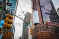 Midtown Manhattan, 48th Street. Traffic light, road sign, and skyscrapers, low angle view,  NYC Royalty Free Stock Photo