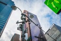 New York City skyscrapers, road sigh, traffic lights, view from below, diminishing perspective Royalty Free Stock Photo