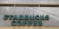 New York City, USA - November 11, 2023: Starbucks coffee bran logo at cafe or coffee shop