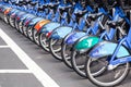 row of parked citi bikes in Manhattan, NYC