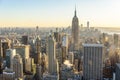 New York City - USA. View to Lower Manhattan downtown skyline with famous Empire State Building and skyscrapers at sunset. Royalty Free Stock Photo