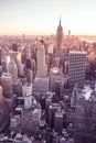 New York City - USA. View to Lower Manhattan downtown skyline with famous Empire State Building and skyscrapers at sunset. Royalty Free Stock Photo