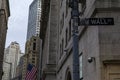 New York City, Wall Street Road Sign, Stock market building behind Royalty Free Stock Photo