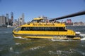 New York City Water Taxi under Brooklyn Bridge Royalty Free Stock Photo