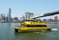 New York City Water Taxi under Brooklyn Bridge Royalty Free Stock Photo