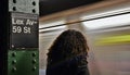 New York City Woman Waiting for Subway Train Commuting MTA Underground Platform Traveling Royalty Free Stock Photo