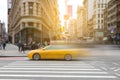 New York City yellow taxi cab in motion across broadway Royalty Free Stock Photo