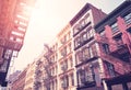 New York cityscape with old buildings with fire escapes, color toning applied, USA Royalty Free Stock Photo