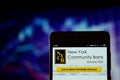 New York Community Bank on the smartphone Royalty Free Stock Photo
