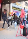 Salvation Army soldier performs for collections in midtown Manhattan. Royalty Free Stock Photo