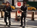 Salvation Army soldiers perform for collections in midtown Manhattan during holidays season Royalty Free Stock Photo