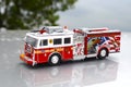 New York Fire and Rescue with Water Canon Truck Department Red Toy with details side angle Royalty Free Stock Photo