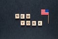 New york inscription on a black background with the American flag Royalty Free Stock Photo