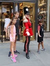 A doorman dressed as a toy soldier stands outside newly reopened the FAO Schwarz flagship store at Rockefeller Plaza