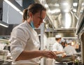 Executive Sous Chef Christin Bourgeois in the kitchen of newest Micheline Star Chef Daniel Boulud`s restaurant Le Pavillon