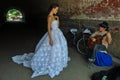 NEW YORK - June 13: Model Kalyn Hemphill poses by street musician