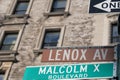 New York Malcom X Boulevard Lenox Avenue street sign Royalty Free Stock Photo