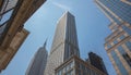 New York, Manhattan. High buildings view from below against blue sky background Royalty Free Stock Photo