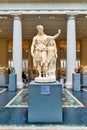 New York. Manhattan. United States. The Metropolitan Museum of Art. Marble statue of Dionysus leaning on an archaistic figure.