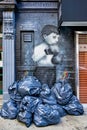 New York. Manhattan. United States. Street graffiti and garbage at Little Italy. Tribute to Irish and Italian immigrants