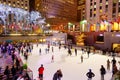 NEW YORK - MARCH 18, 2015: Tourists and newyorkers skate in the famous Rockefeller Center skatink rink, New York City.