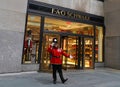 A doorman dressed as a toy soldier stands outside the FAO Schwarz flagship store at Rockefeller Plaza in Midtown Manhattan