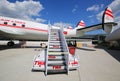 TWA Hotel`s 1958 Lockheed Constellation airplane in front of the landmark TWA Flight Center building designed by Eero Saarinen Royalty Free Stock Photo