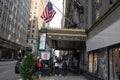 Unidentified migrants in front of New York City\'s new migrant welcome center at the former four-star Roosevelt Hotel