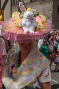 New York, New York: A smiling woman wears an elaborate Easter bonnet