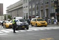 NYPD traffic agent directs traffic at NYC intersection