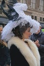 Woman wearing a black and white feathered hat and a fur-trimed stole at the Fifth Avenue Easter Parade Royalty Free Stock Photo