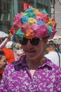 New York, New York: Young woman wearing hat made with cocktail umbrellas