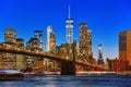 New York night view of the Lower Manhattan and the Brooklyn Bridge across the East River. Royalty Free Stock Photo