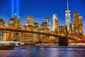 New York night view of the Lower Manhattan and the Brooklyn Bridge across the East River. Royalty Free Stock Photo