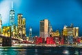 New York night view of the Lower Manhattan and the Brooklyn Bridge across the East River Royalty Free Stock Photo