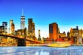 New York night view of the Lower Manhattan and the Brooklyn Bridge across the East River Royalty Free Stock Photo