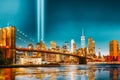 New York night view of the Lower Manhattan and the Brooklyn Bridge across the East River Royalty Free Stock Photo