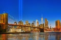 New York night view of the Lower Manhattan and the Brooklyn Bridge across the East River. Royalty Free Stock Photo