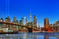 New York night view of the Lower Manhattan and the Brooklyn Bridge across the East River. Royalty Free Stock Photo