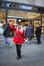 A doorman dressed as a toy soldier stands outside newly reopened the FAO Schwarz flagship store at Rockefeller Plaza
