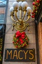 Macy`s sign with Christmas decoration at Macy`s Herald Square on Broadway in Manhattan