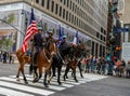 New York City Police Department Mounted Unit officers lead the 102nd Annual Veteran`s Day Parade along Fifth Avenue in Manhattan